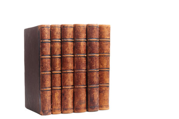 Stack of old books isolated on white background