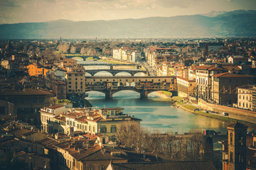 Fototapeta na wymiar Cityscape Of Florence Italy With Mountain Range.