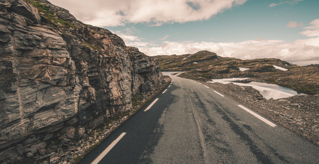 Road In Rocky Mountain Of Norway.