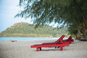 Obraz na płótnie Canvas Wooden chair on the beach at Koh Kood(kood island) , Thailand