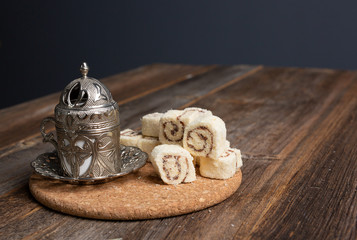turkish delight and coffee on wooden background