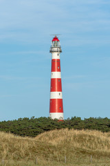 Fototapeta na wymiar Lighthouse of the island of Ameland.