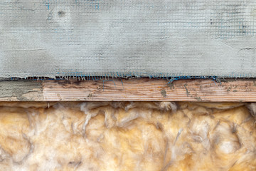 Insulation of the ceiling, roof or walls. Fiberglass, wood, cemented mesh background texture