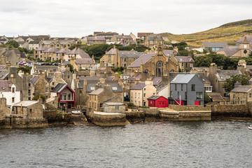 historic village of Stromness on Orkney mainland, Scotland. Seaside view of this fisherman town at...