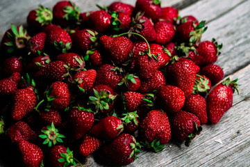 Strawberry closeup on a wooden table