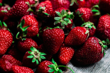 Strawberry closeup on a wooden table
