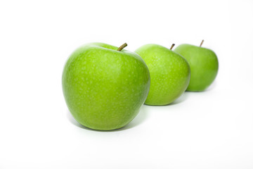 Green Apple on an isolated white background. Proper nutrition. Diet.