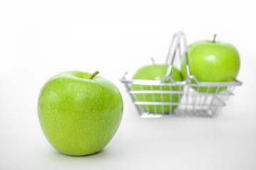 Green Apple on an isolated white background. Proper nutrition. Diet.