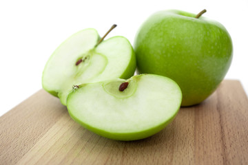 Green Apple on an isolated white background. Proper nutrition. Diet.