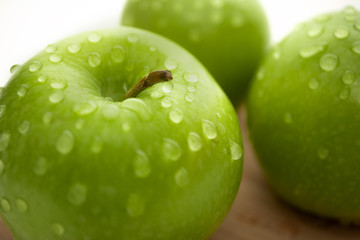 Green Apple on an isolated white background. Proper nutrition. Diet.