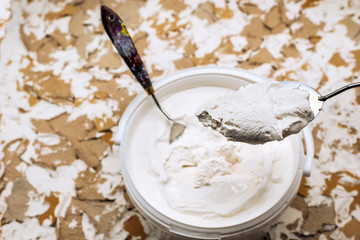 White putty, putty knives and spatulas.