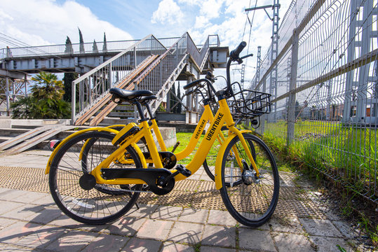 SOCHI (ADLER) - APR 11: Yellow bicycles for rent by URENTBIKE company in Sochi (Adler) on April 11. 2019 in Russia