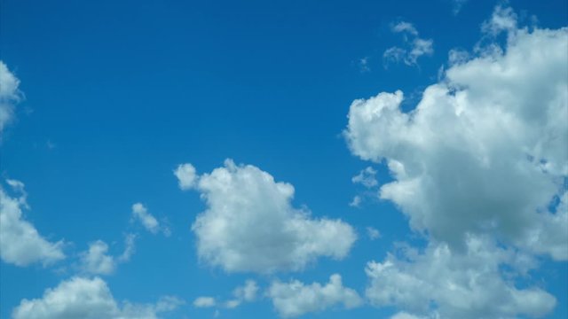 4k Uhd Seamless Loopable Time Lapse Of White Fluffy Clouds In Loop