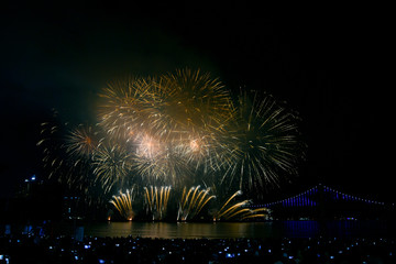 Colorful fireworks and Gwangan Bridge in Busan City , South Korea.