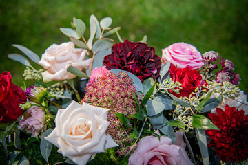 Stunning bridal bouquet of flower with roses and dahlias