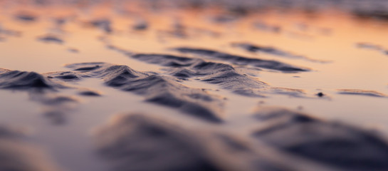 Close-up of sand dunes in the sunset