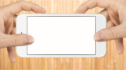 two hands holding a smartphone horizontally with blank space on the screen
