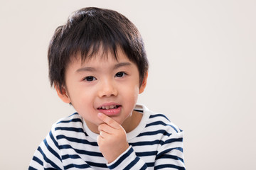 Handsome asian kid on white background