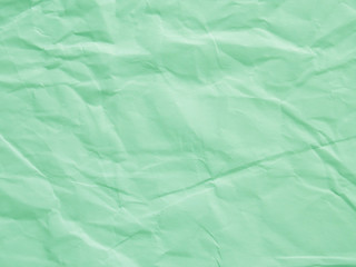 Obraz premium Mint green crumpled paper texture background