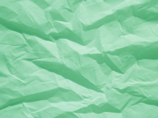 Obraz premium Mint green crumpled paper texture background