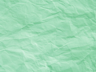 Mint green crumpled paper texture background
