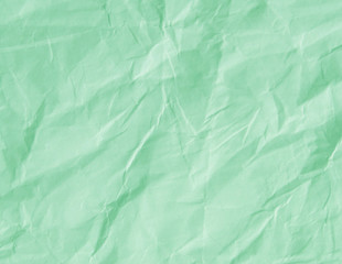 Mint green crumpled paper texture background