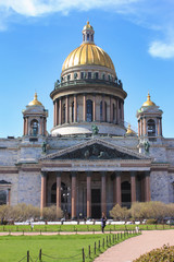 Fototapeta na wymiar Saint Isaac's Cathedral in Saint Petersburg, Russia. St Petersburg cityscape with monumental beautiful church architecture, famous city attraction on sunny spring day view