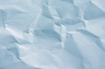 Light blue crumpled paper texture background