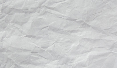 Fototapeta premium White crumpled paper texture background