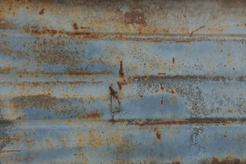 gray brown metal background from rusty old wall