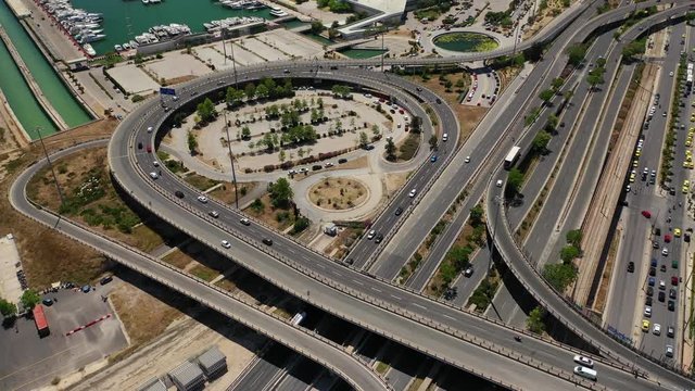 Aerial drone video of National road junction interchange motorway leading to Faliro area, Athens Riviera, Attica, Greece