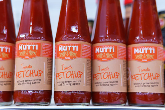 Tyumen, Russia-may 17, 2020: ketchup mutti firm Parma, sale of tomato sauce on store shelves, selective focus
