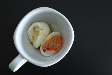 Soft-boiled egg in a white glass It's an easy breakfast.