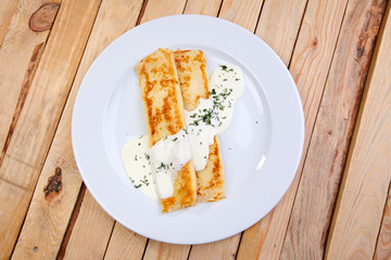 stuffed pancakes with sour cream