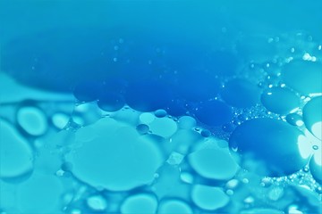 Abstract blue bubbles oil with water background
