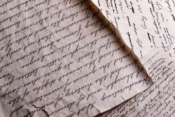 Old yellow sheets of paper with text