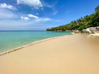 Fototapeta na wymiar the wonderful beach of the luxury Surin Phuket hotel, Phuket, Thailand