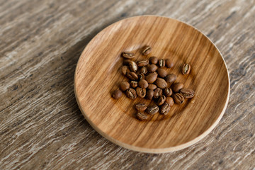 Fototapeta na wymiar coffee beans on a dark background