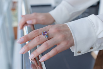 Obraz na płótnie Canvas Close-up of a girl’s precious ring on a girl’s finger