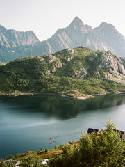 35mm Kayaking in Lofoten - A shot taken on my Leica M6 film camera of two kayakers navigating their...