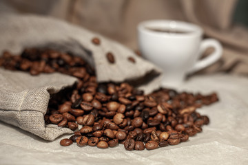Coffee cup and coffee beans in a bag