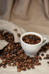 Coffee cup and coffee beans in a bag