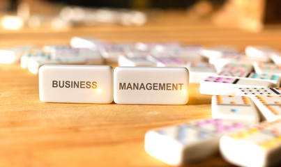 Signs of business management or strategy business concept. Dominos game. Competition for success. Creative ideas of tag