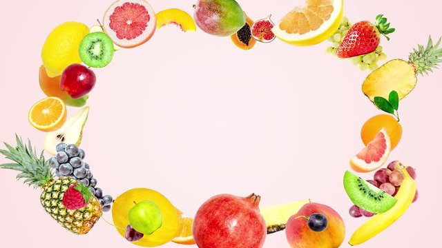 Creative 4k stop motion animation of many different tropical fruits appearing from the center, freezing for a moment and scattering in different directions on a summer pink background. Fruit explosion