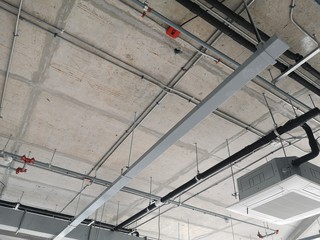 Installation of steel pipes And light boxes inside the building