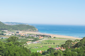 Fototapeta na wymiar mountain scene with ocean and beach views
