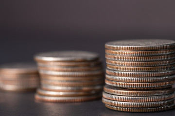 Coins stacked isolated black background money, financial, business growth concept