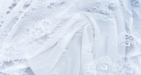 Soak a cloth before washing, white cloth