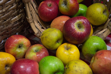 Apple, red, yellow and green in basket