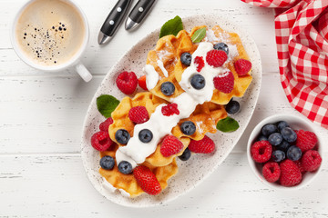 Delicious belgian waffles with summer berries